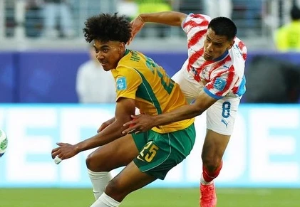Australia mengamankan tiket ke babak 32 besar Piala Dunia 2026 setelah bermain imbang tanpa gol melawan Paraguay