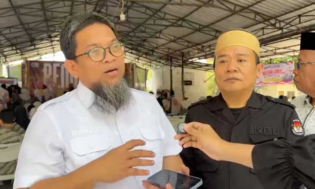 Kepala Dinas Pendidikan Provinsi Sulawesi Selatan, Andi Iqbal Nadjamuddin dan Ketua KPU Sulsel Hasbullah dalam pembukaan Pilketos serentak SMA/SMK di SMAN 21 Makassar, Rabu (30/9/2026). (Dok. Abud/SPos)